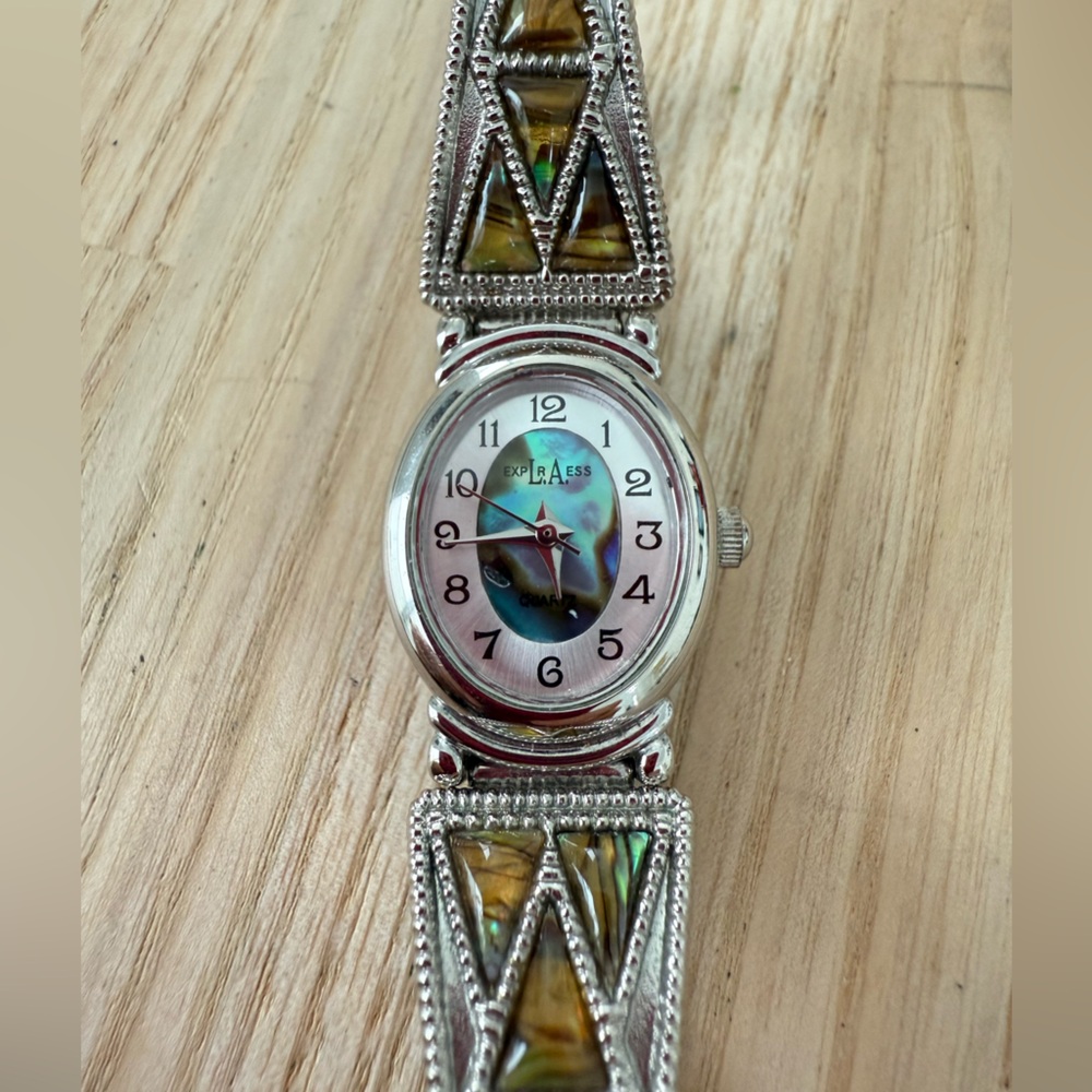 La express ladies oval silver tone abalone watch NEW BATTERY